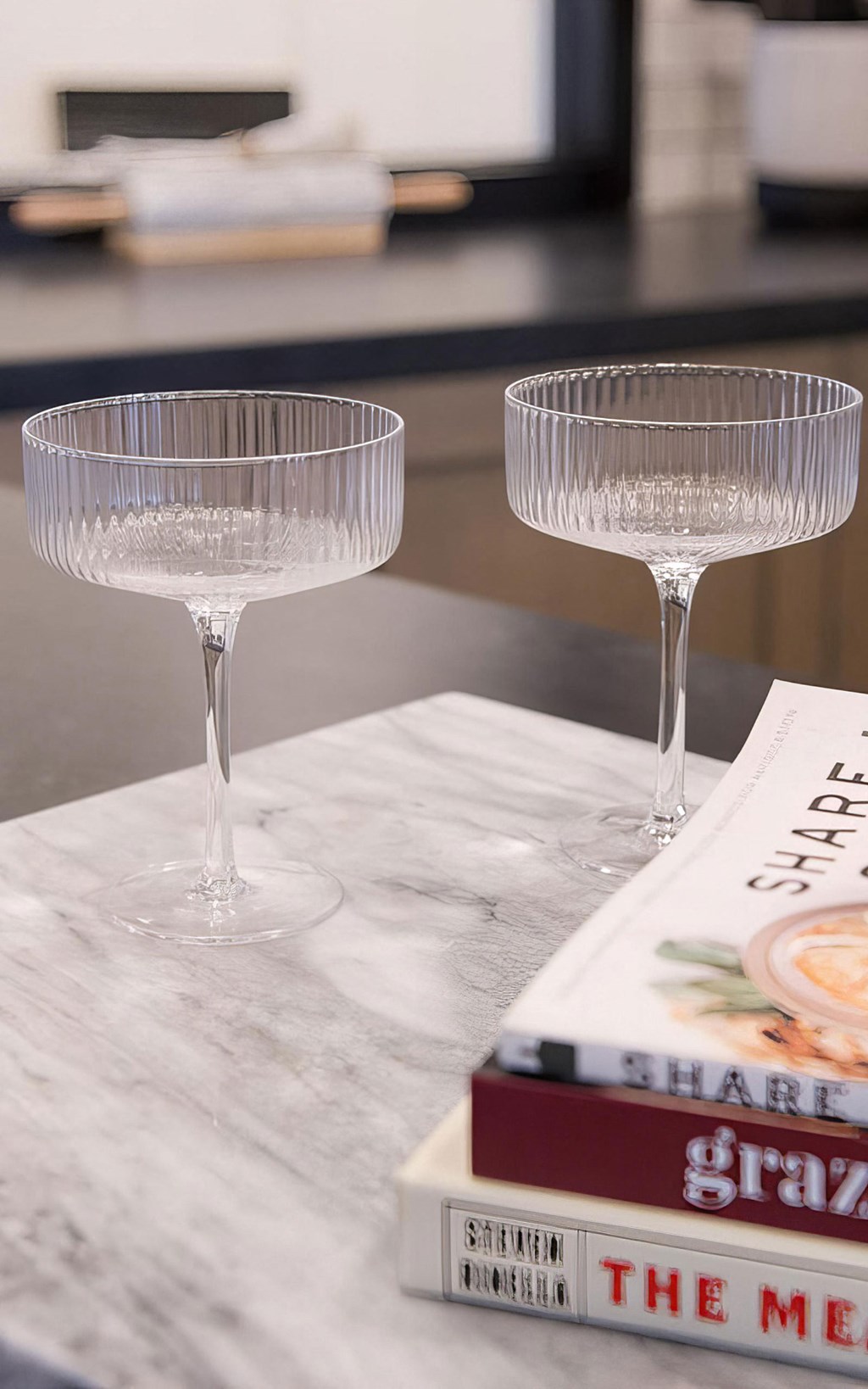 Access to hand-selected glassware and reading material in public areas at Novel Cary