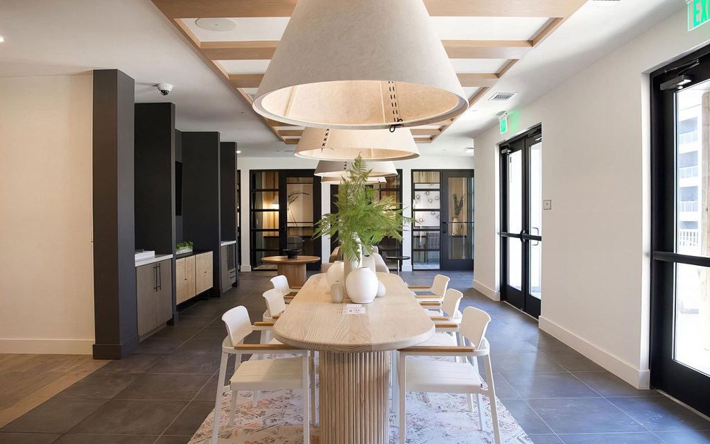 Sophisticated working area with countertop wired with plugs for easy charging at Novel Cary