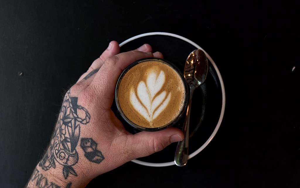 Cozy up with crafted lattes at one of the coffee shops near Novel Cary