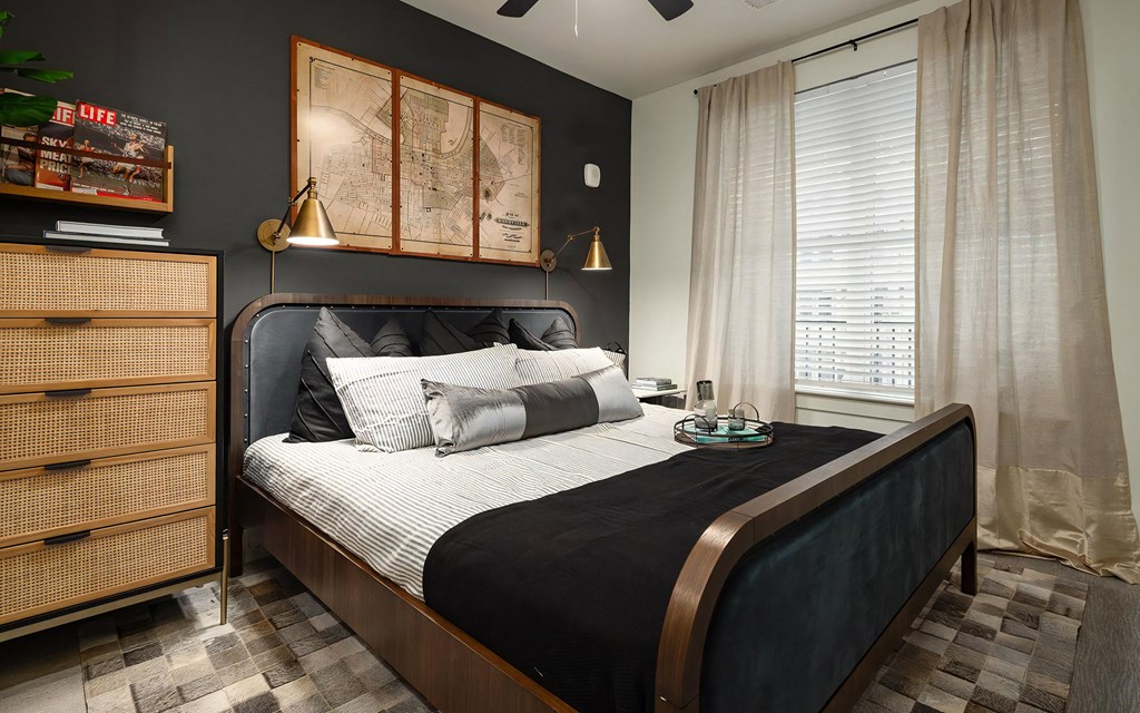 Modern Bedroom with Velvet Upholstered Bed and Ambient Lighting