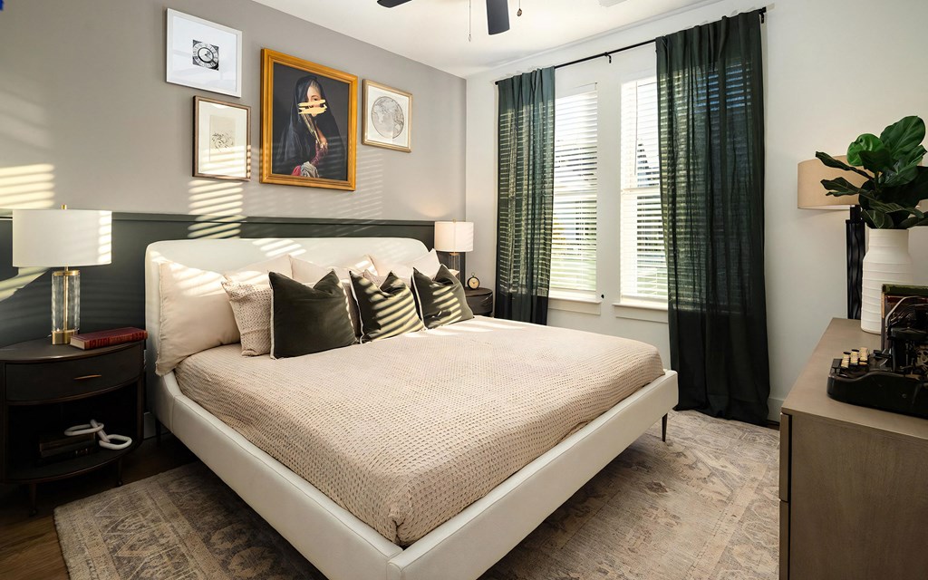 Modern Bedroom with Large Windows and Rich Toned Decor