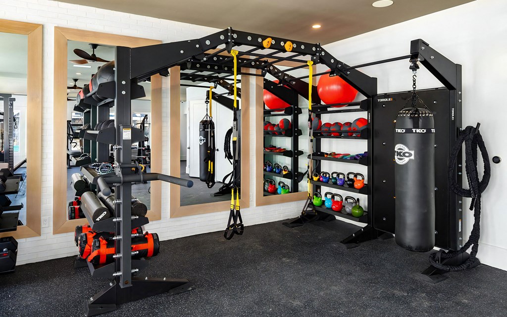 Fully Equipped Fitness Area Featuring Strength & Cardio Stations