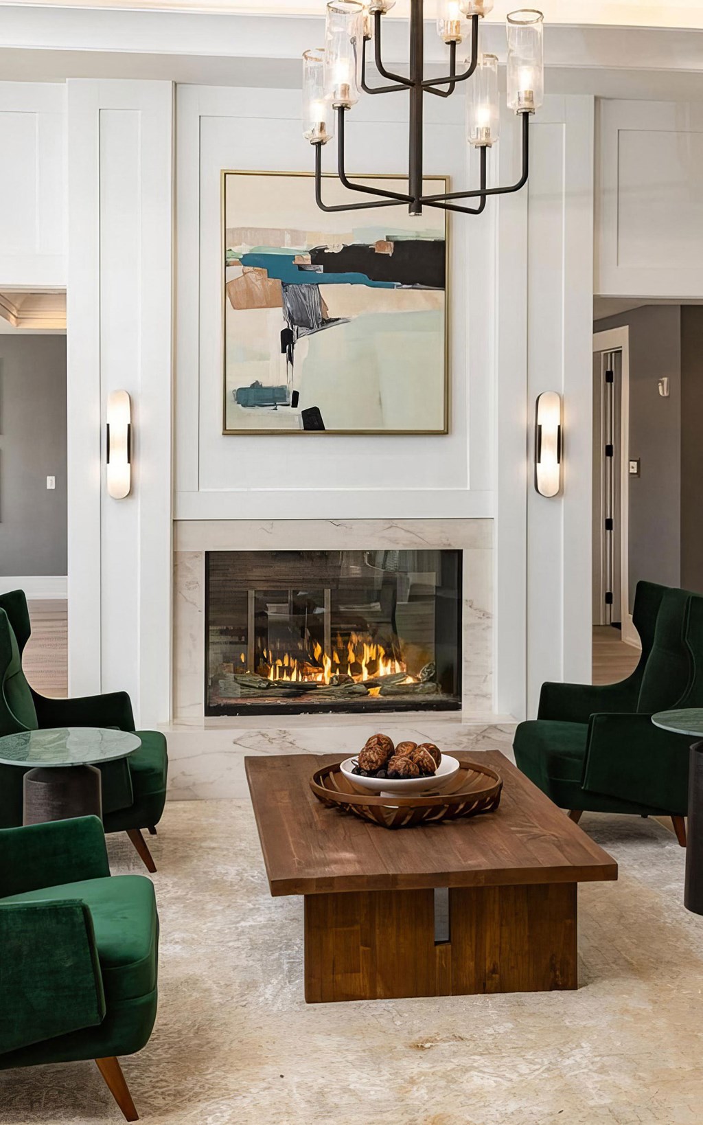 Sophisticated Lounge with Fireplace, Velvet Chairs, and Abstract Art
