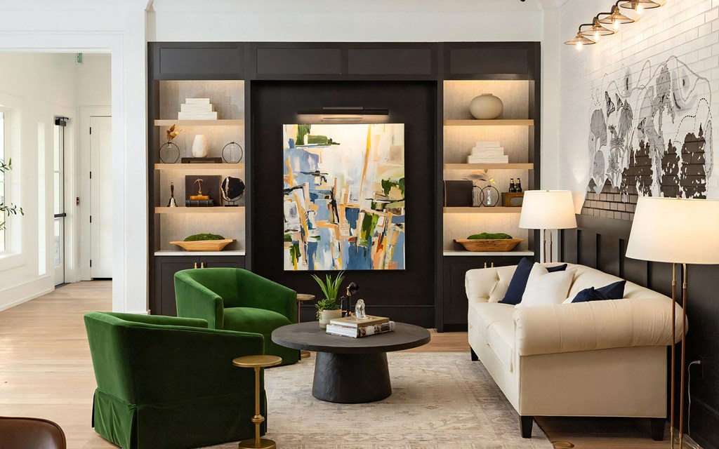 Community Lounge Featuring Art Wall, Plush Seating, and Soft Lighting