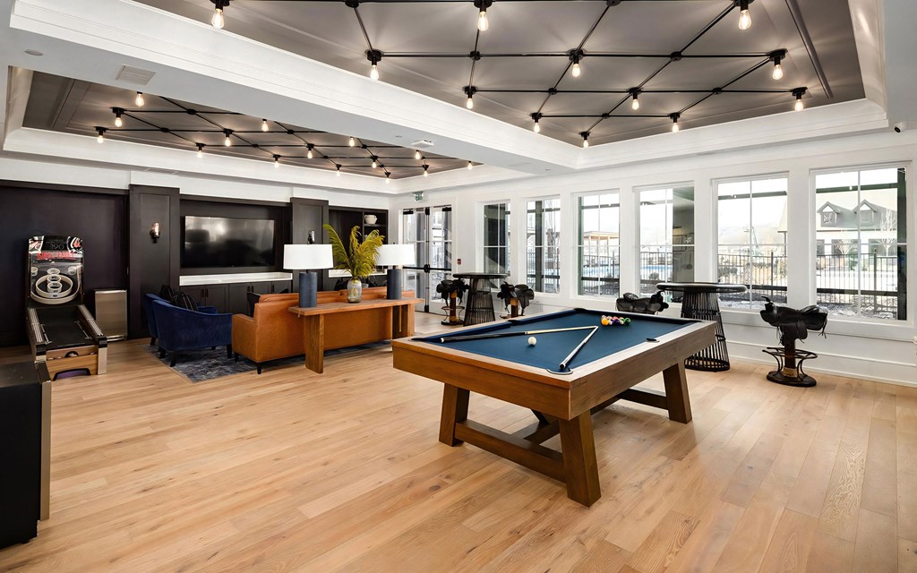 Recreation Area with Game Tables and Ample Natural Light