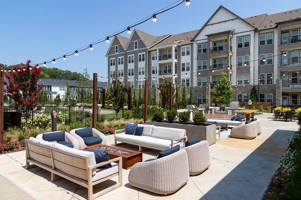 Outdoor Social Lounge at Harpeth Heights with Fire Pit and String Lighting