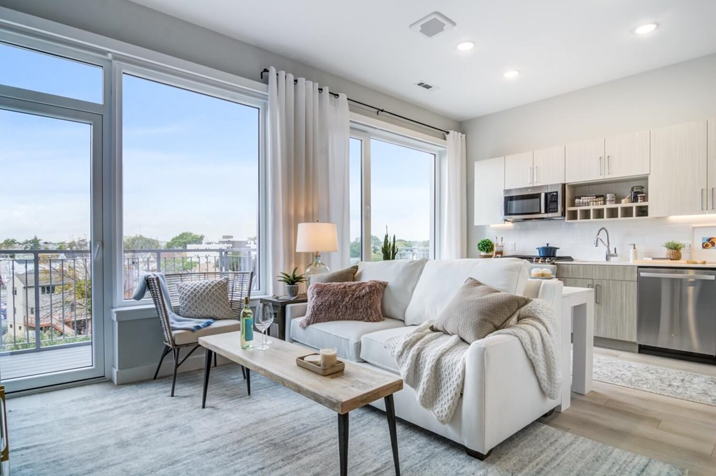 A modern living room with a view of the city.