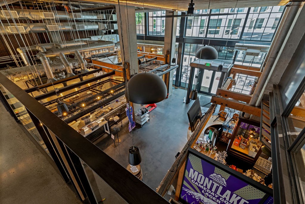 A view from the top of a stairwell looking down at a Montlake sign.