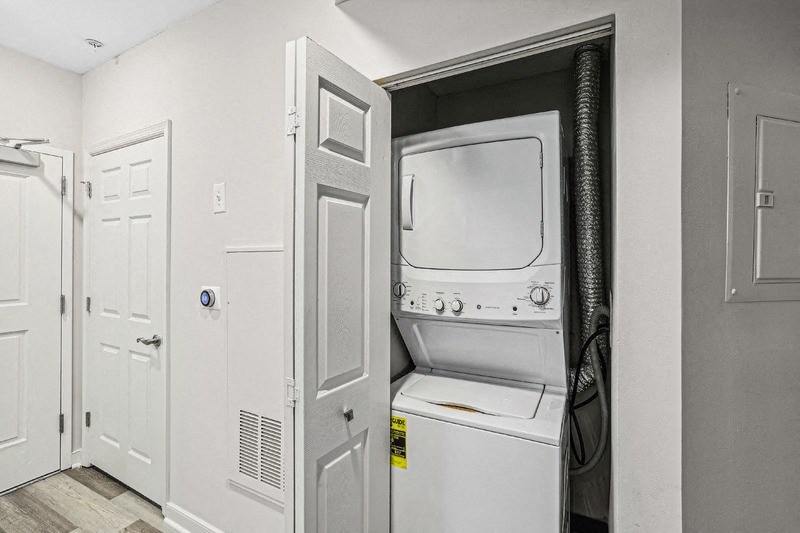 In-Unit Laundry Appliances Behind Bi-Fold Doors