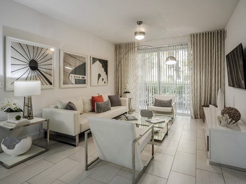 Light-Filled Living Area with Sliding Doors to Private Balcony