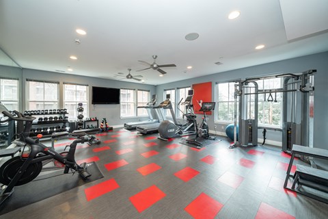 Fitness center with treadmills and strength training equipment at 750 Summer Street Apartments, Stamford, CT 06901