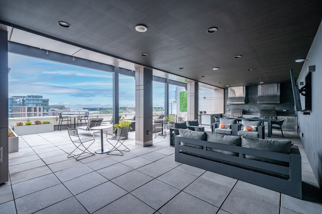 A modern living room with a view of the city.