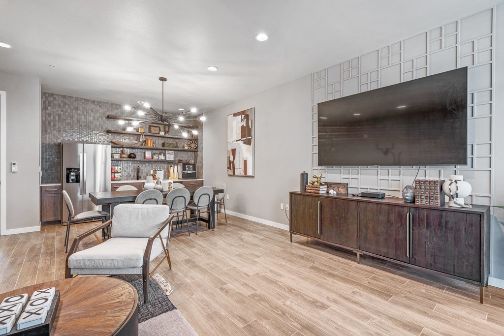 the reserve at bucklin hill clubhouse resident lounge with tv and dining area