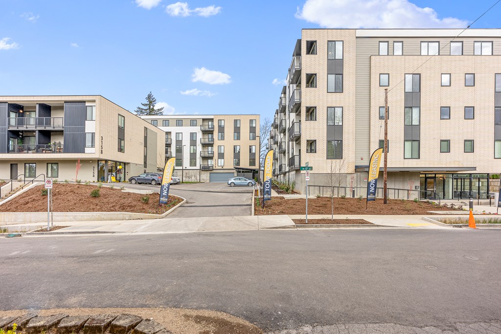 a view of a street in front of a building