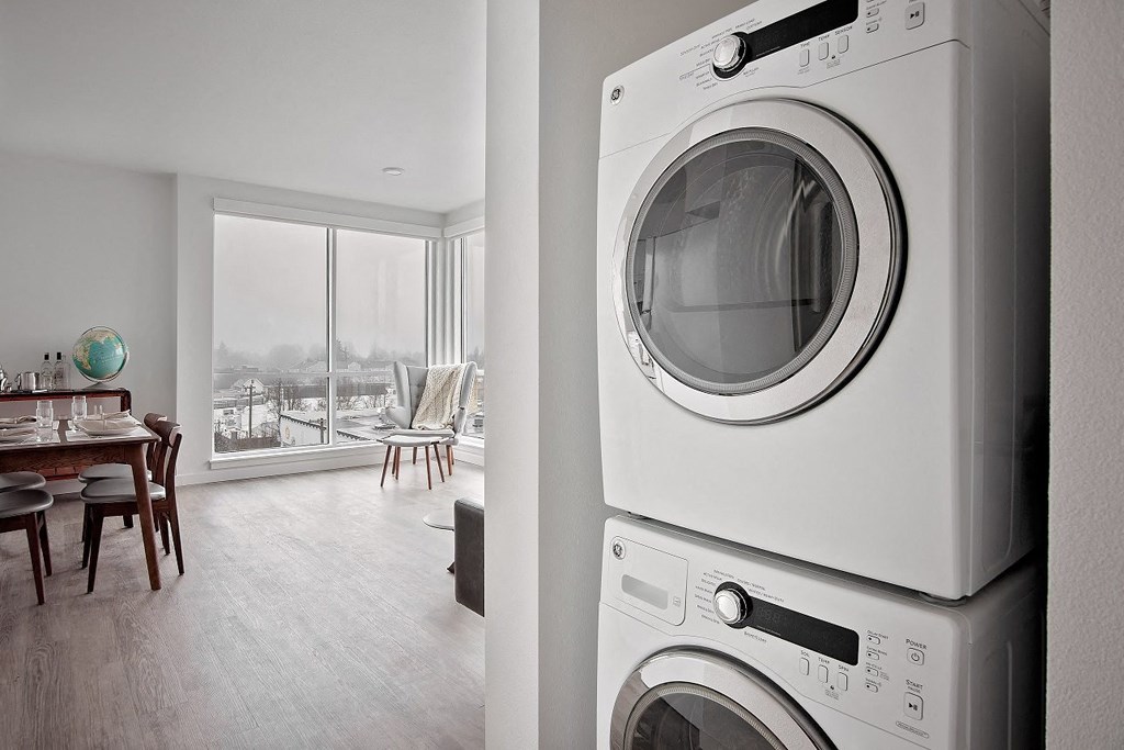 laundry with view of living room