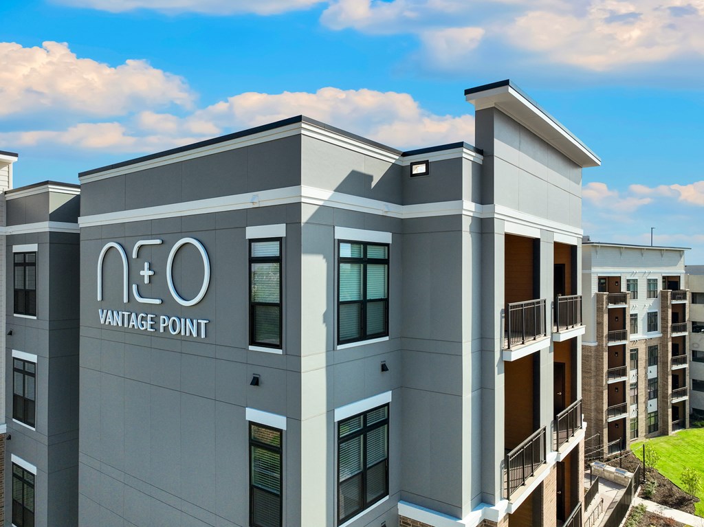 a building with the point logo on it