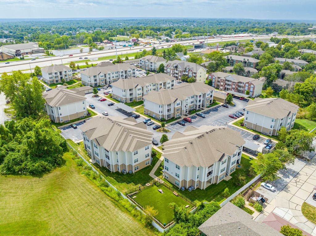 an aerial view of a row of houses in a suburban neighborhood