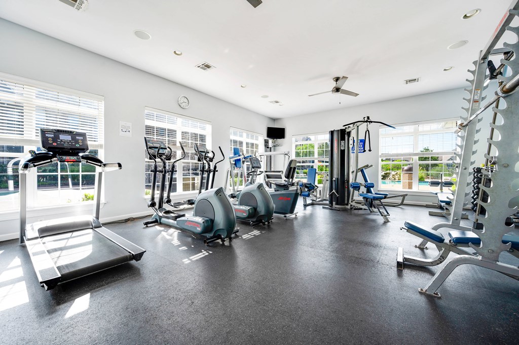 the gym at the enclave at woodbridge apartments in sugar land, tx