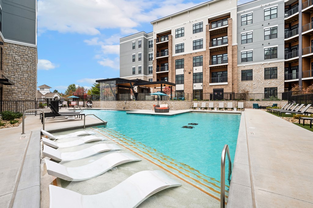 our apartments have a large swimming pool with lounge chairs