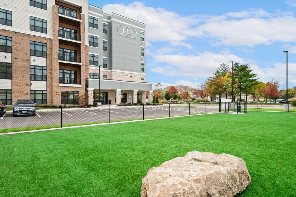 the preserve at green valley apartments exterior view of building and grass