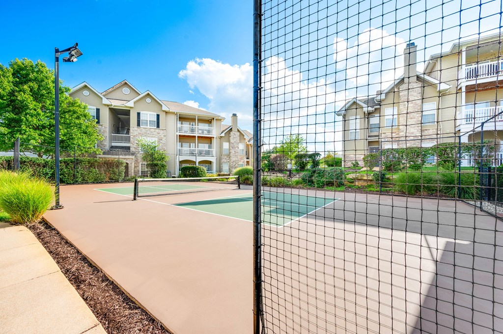 a tennis court at the reserve at riverdale apartments in riverdale, nj