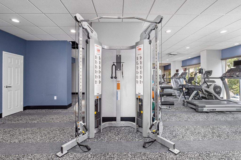 a photo of a fitness room with exercise equipment