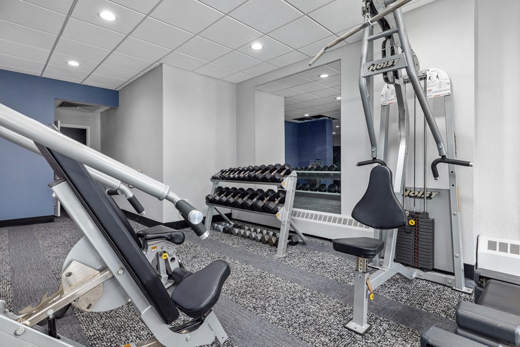 the gym at the enclave at woodbridge apartments in sugar land, tx