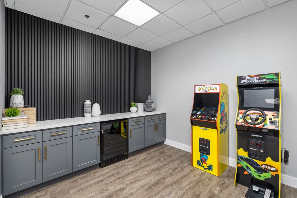 a room with consoles and other games