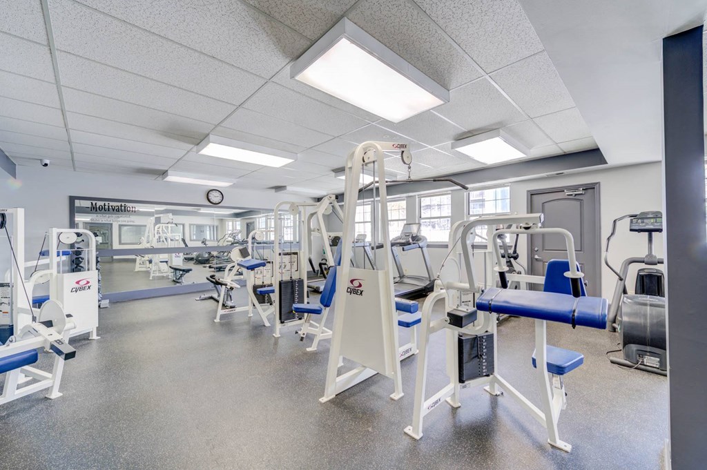 a room filled with cardio equipment in a healthcare facility