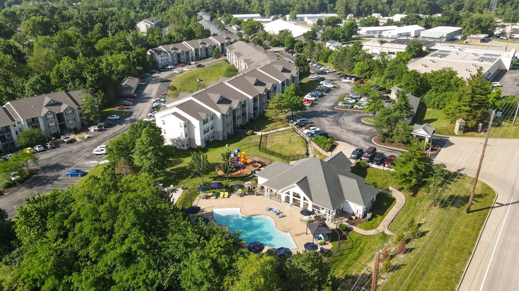 an aerial view of the resort with a swimming pool