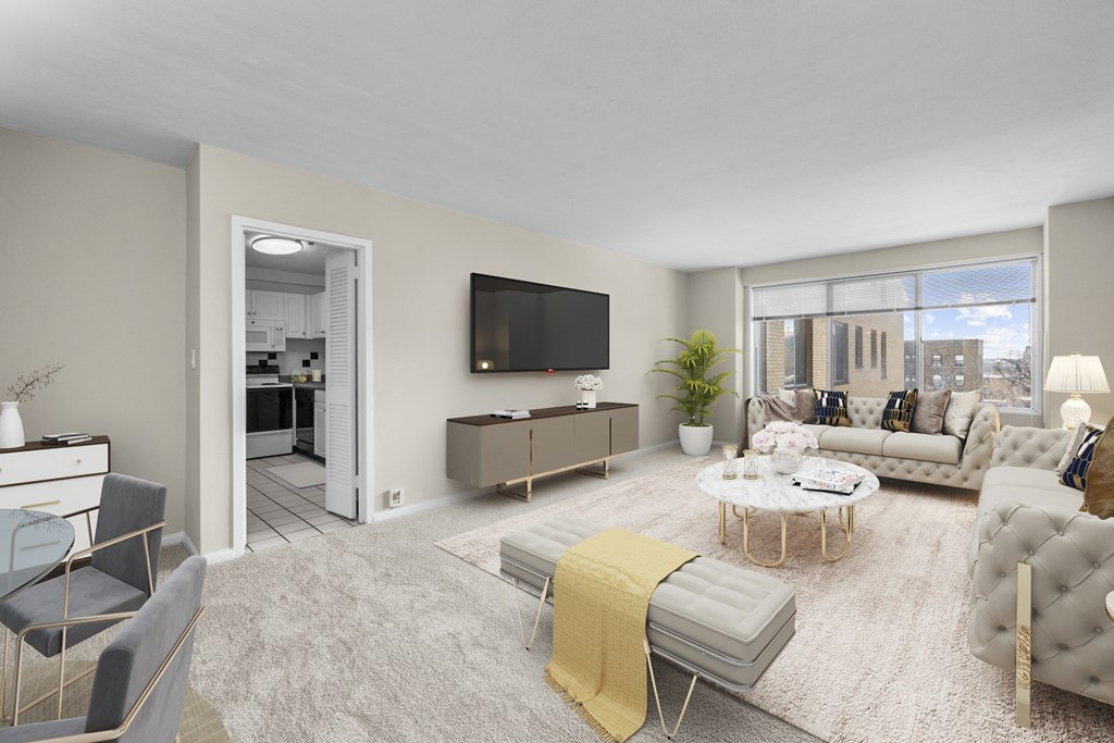 a living room with a couch and a tv