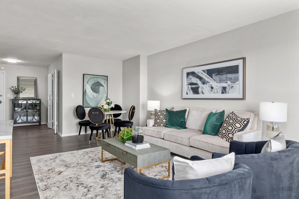 a living room with gray walls and a white couch