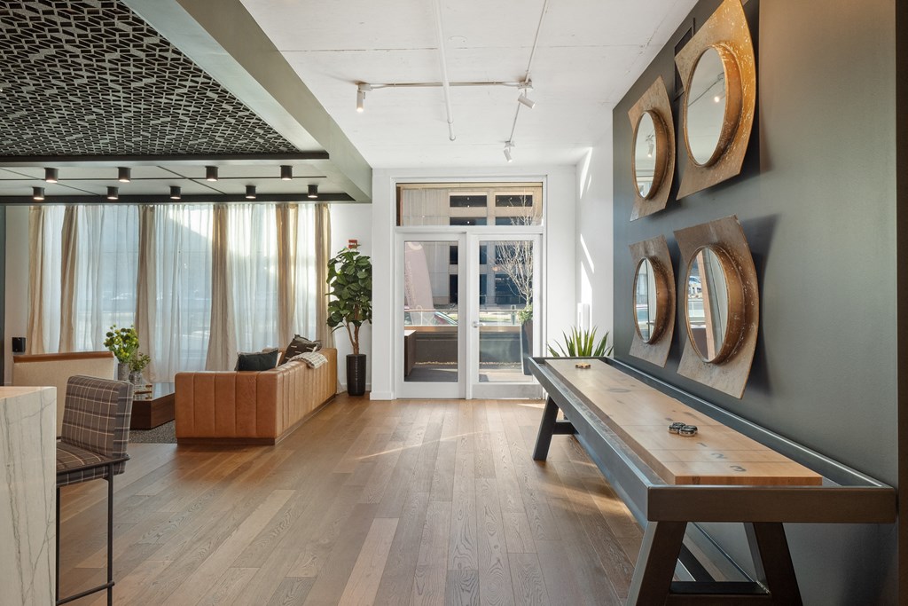 a living room with a couch and a table