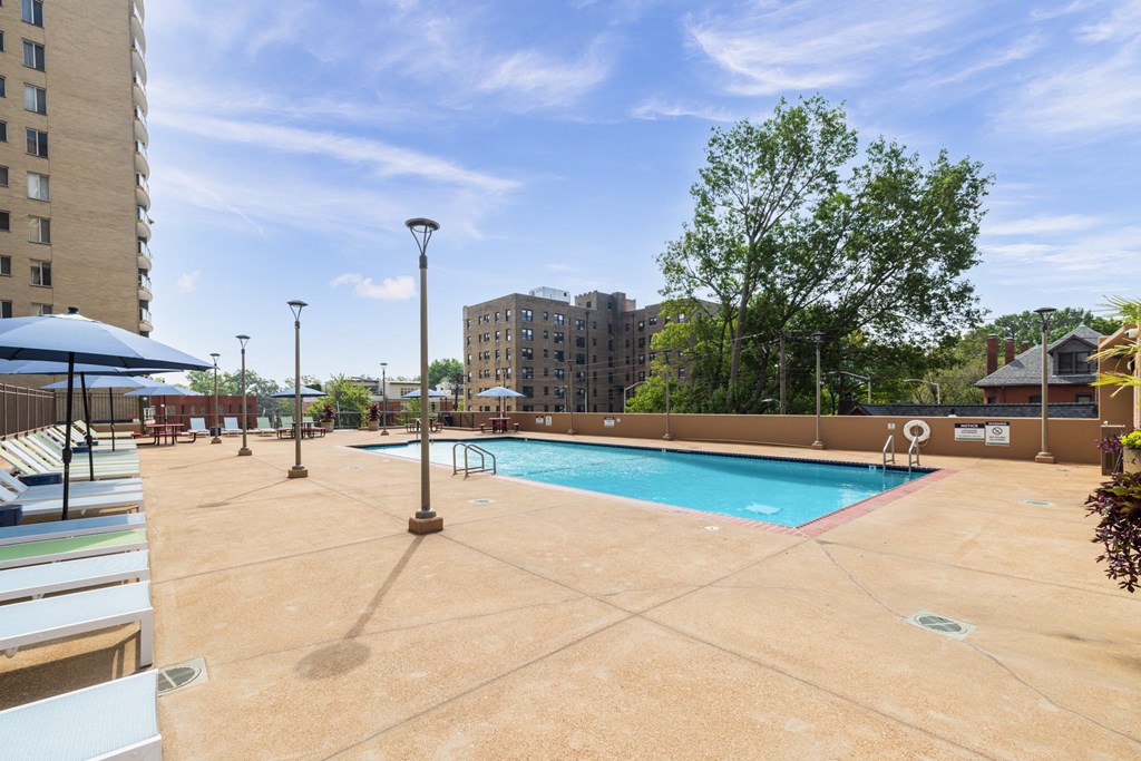this is a photo of the pool area at harvard square apartments in dallas, tx