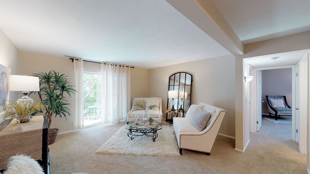 a living room with a couch and a table