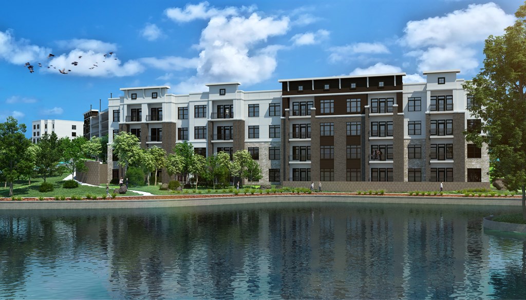 a rendering of an apartment building on the edge of a body of water
