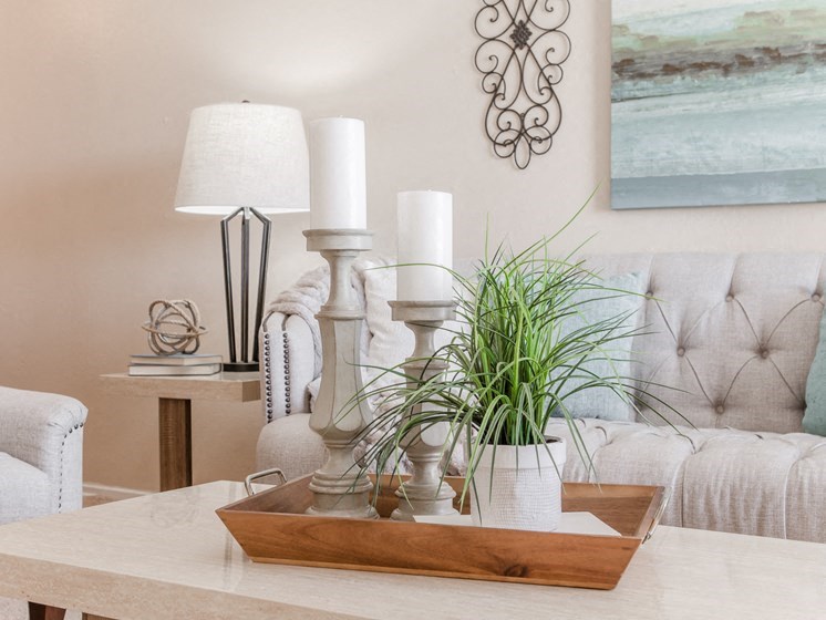 a living room with a table and a couch