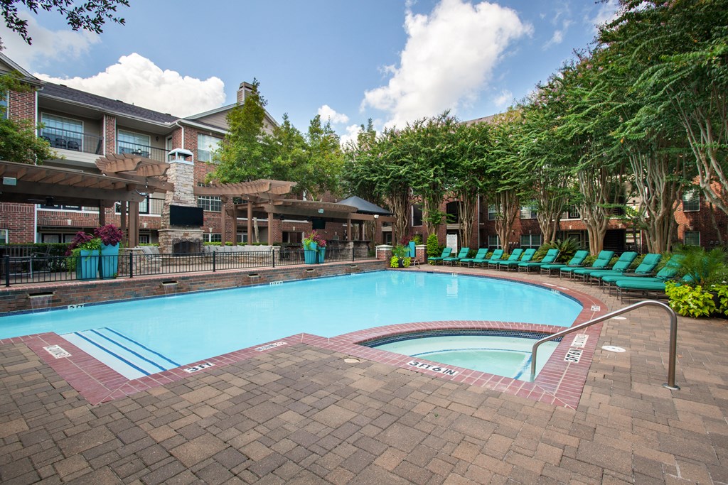 a swimming pool at the resort on a sunny day