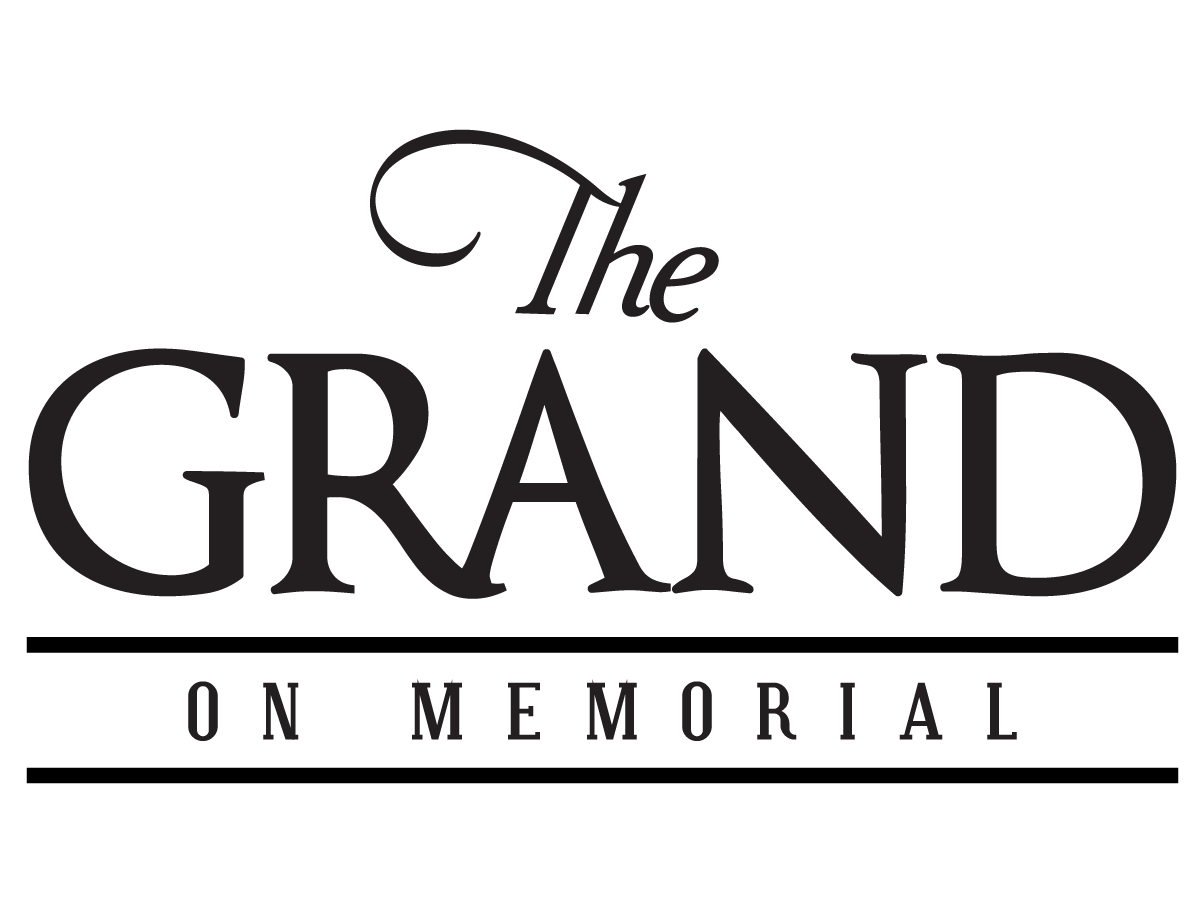 the grand on memorial green logo with black text on a green background