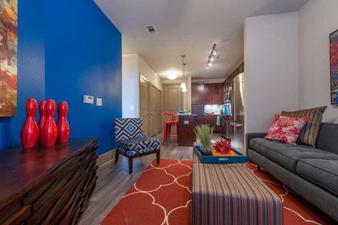 a living room with a couch and a table