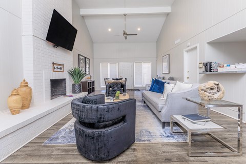 a living room with a couch and a tv