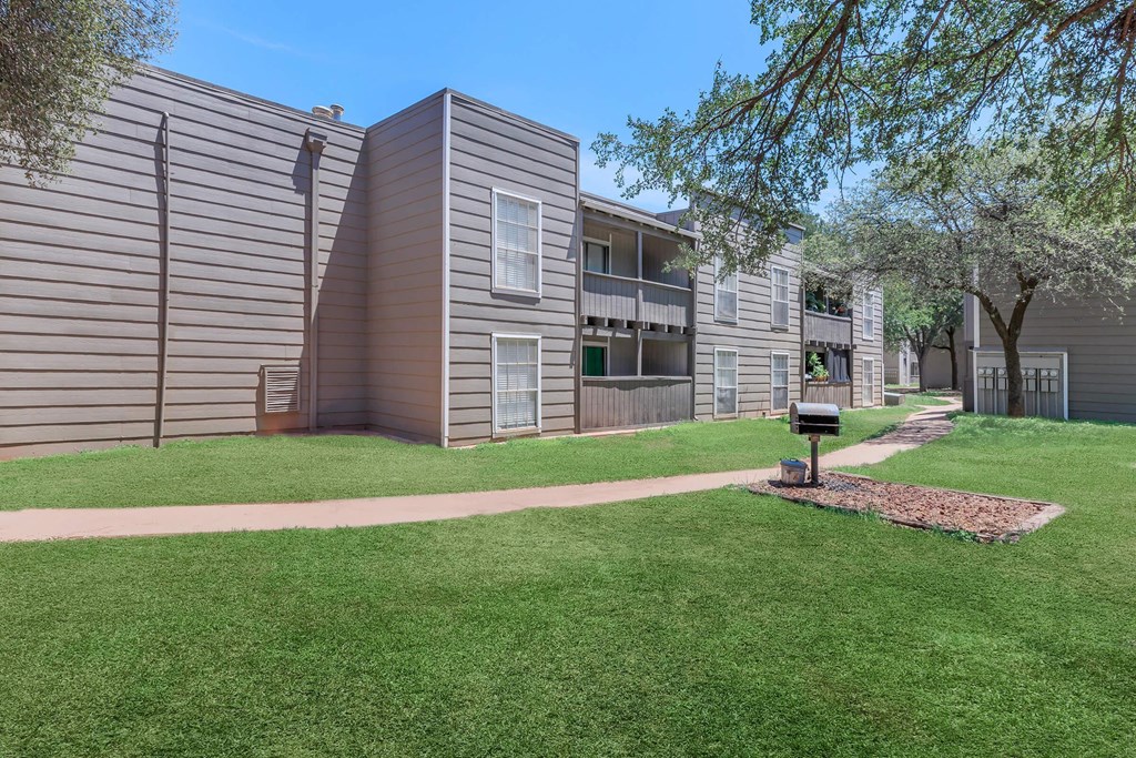 our apartments have a spacious yard and green grass