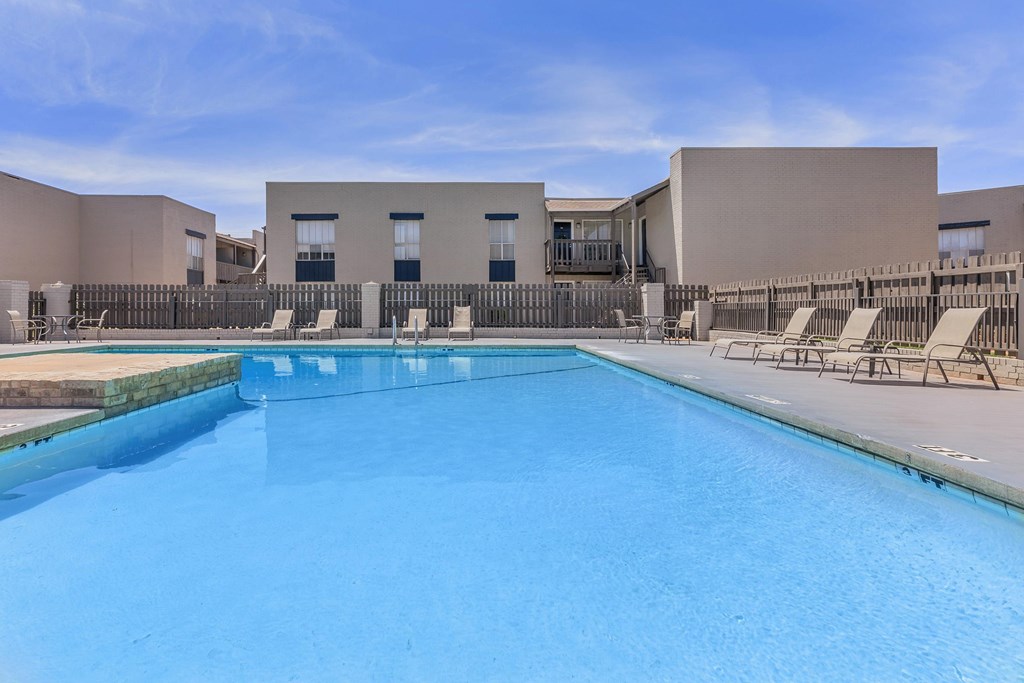 our apartments have a large pool and lounge chairs