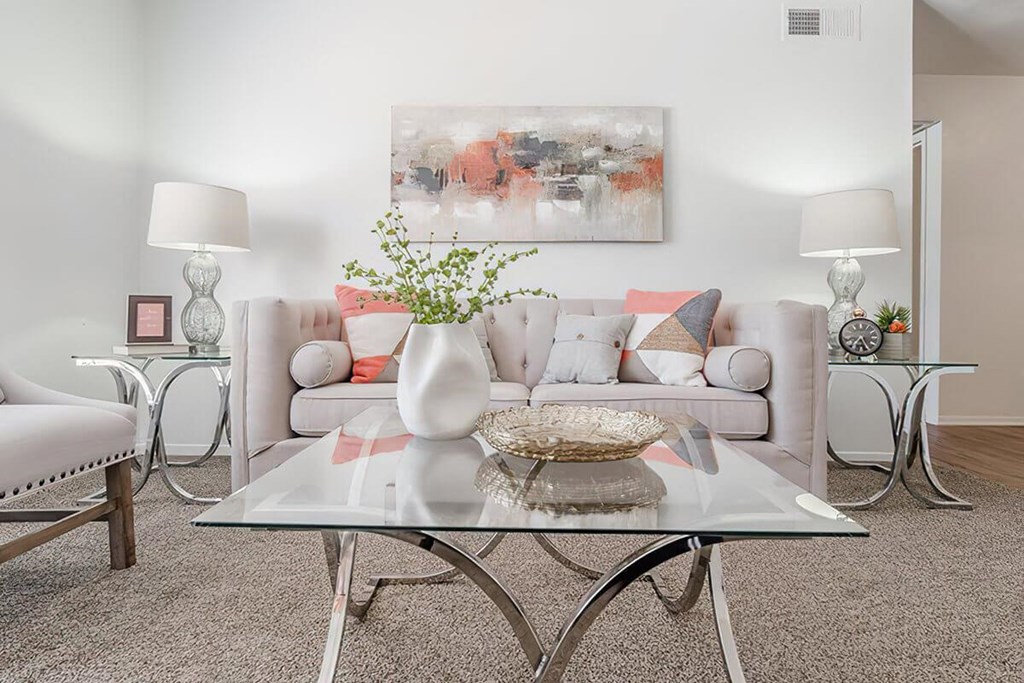 a living room with a couch and a table