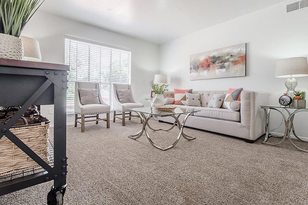 a living room with a couch and a table