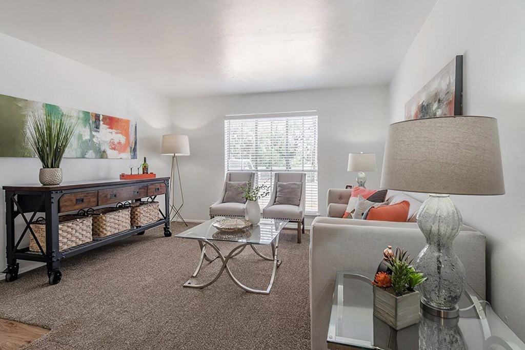 a living room with a couch and a table
