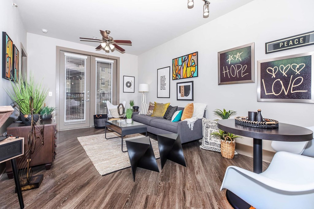 a living room with a couch and a table