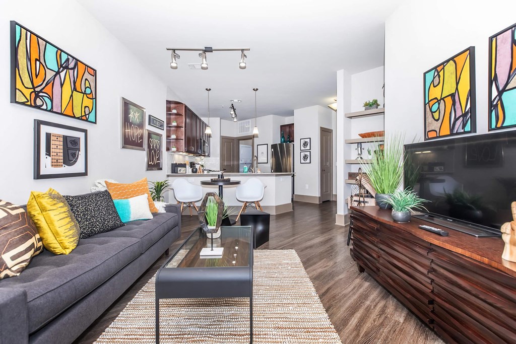 a living room with a couch and a tv