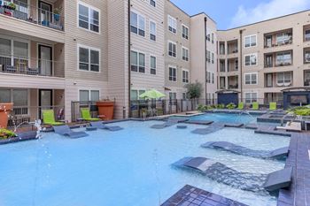 our apartments have a large swimming pool with lounge chairs