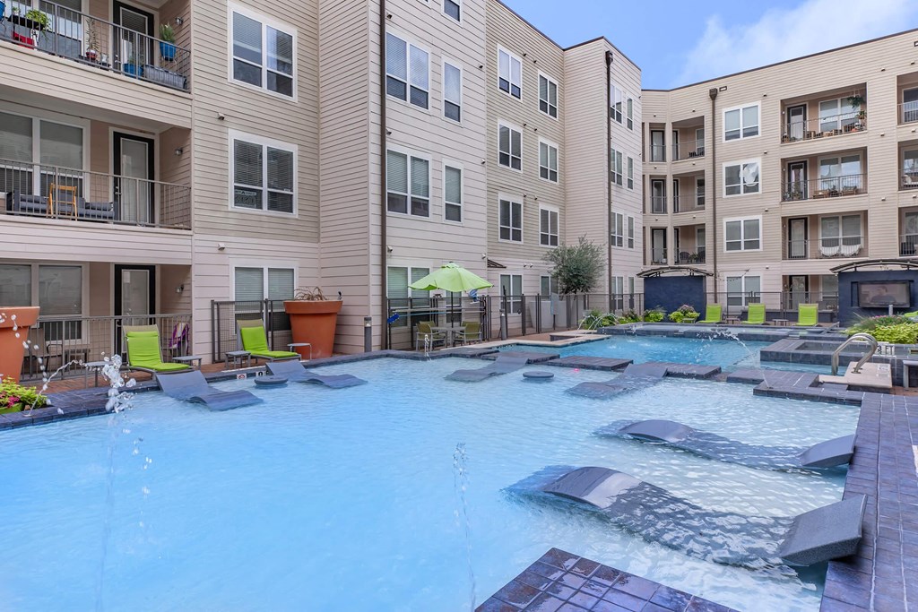 our apartments have a large swimming pool with lounge chairs